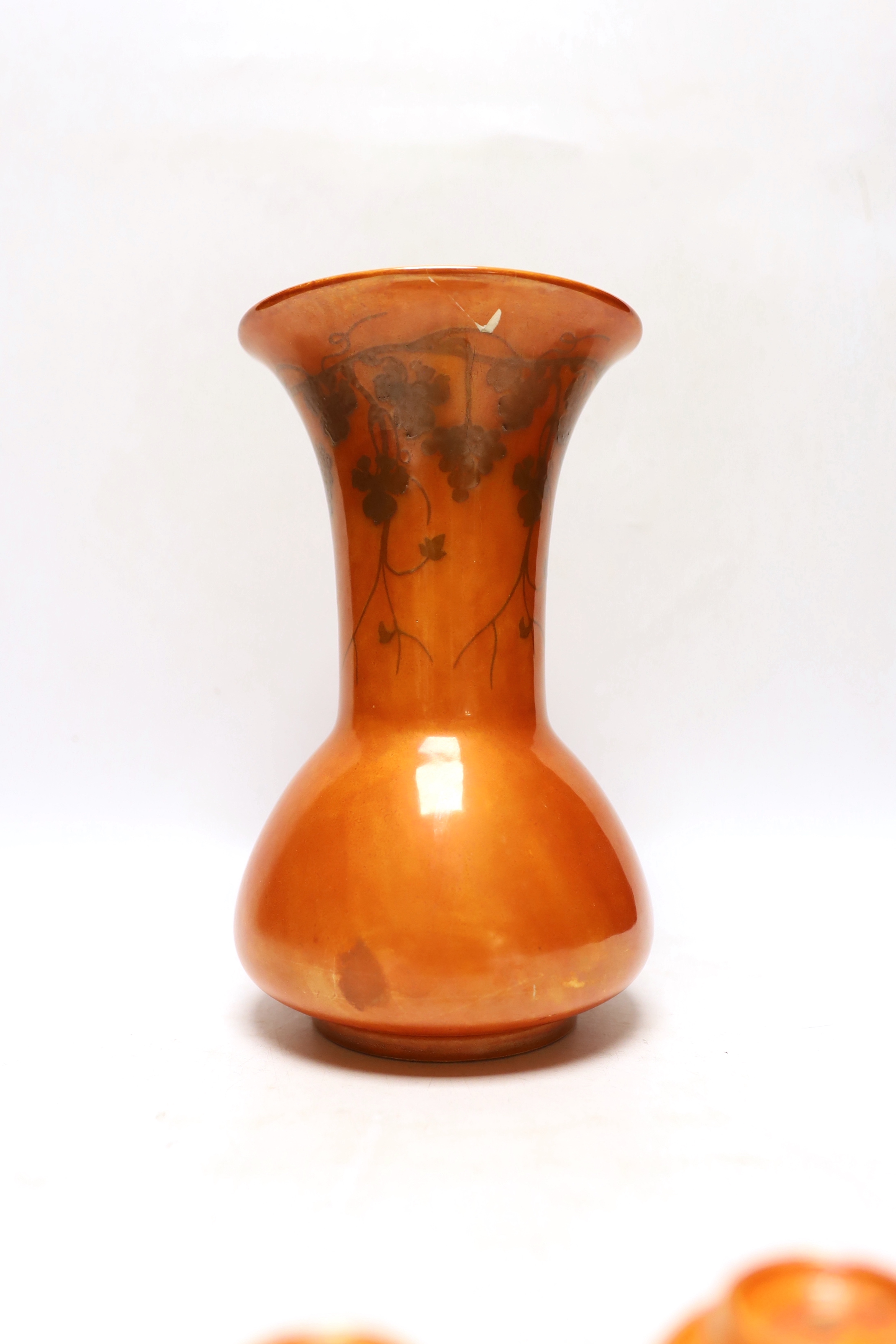 A Ruskin orange glazed vase (a.f) and three similar small bowls by Ruskin and Doulton, vase 23.5cm